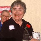 Casserly accepts her Andrus Award for Community Service at the annual volunteer recognition event.