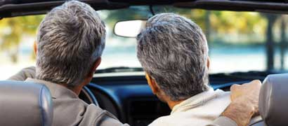 Back of heads of couple driving (h)