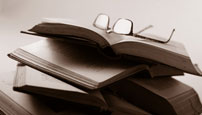 Glasses on a stack of books (e)